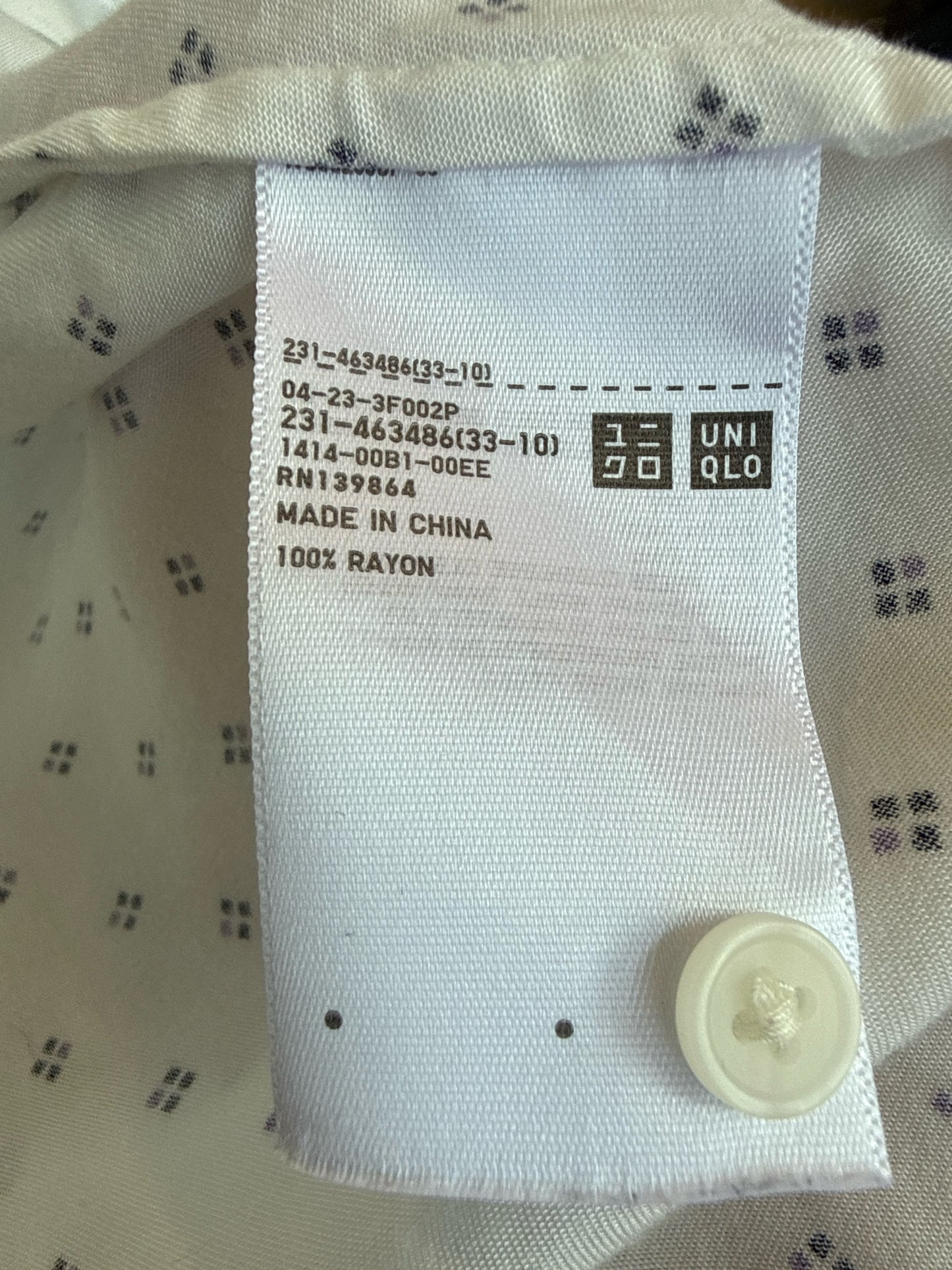 uni qlo Size S White Top