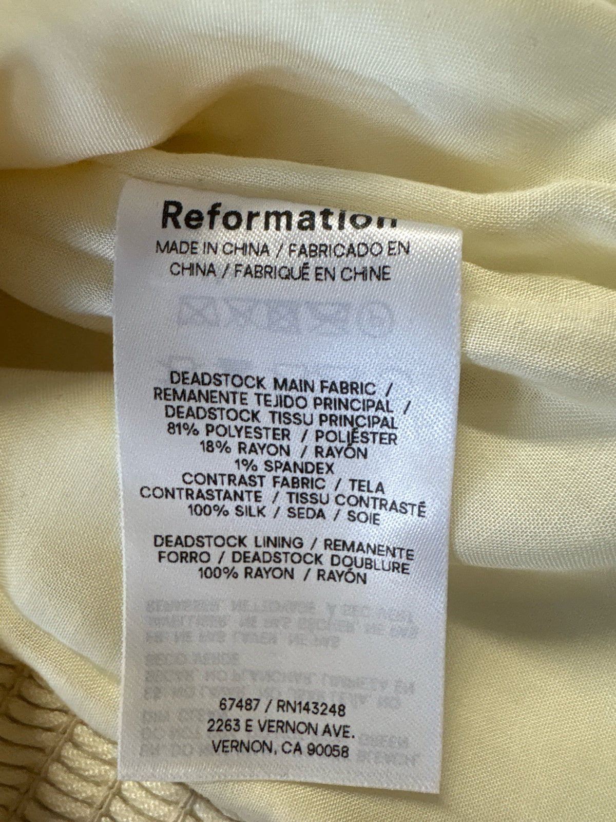 Reformation Size 2 Cream + black Top