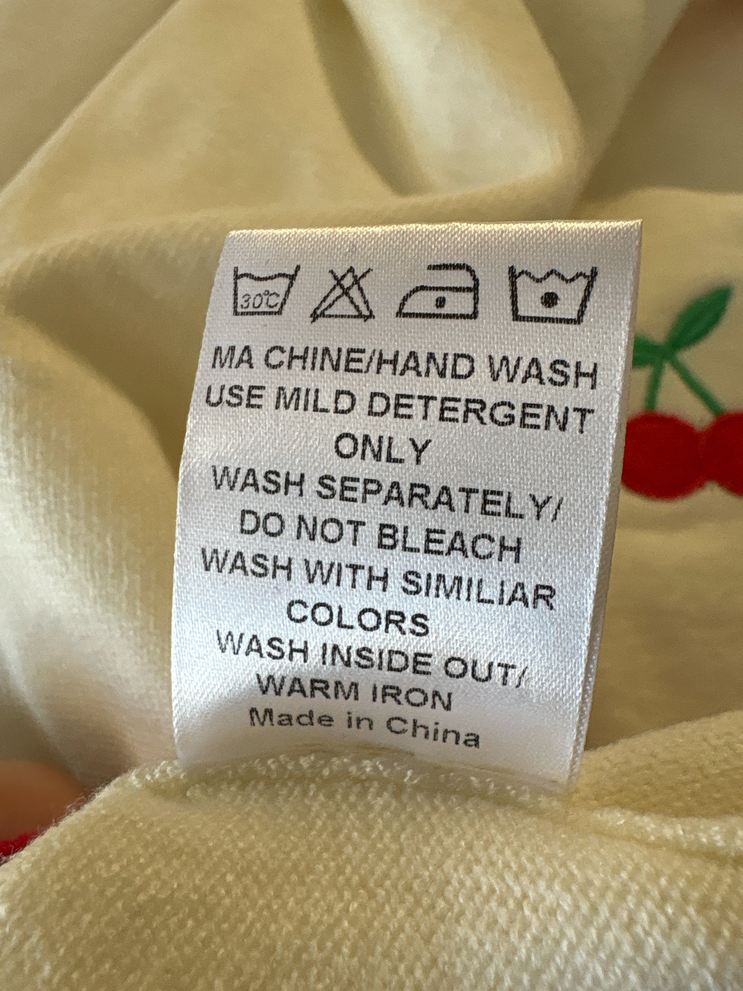 Size M cream + red Sweater